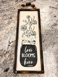Blooms Sign