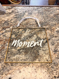 Moment Sign